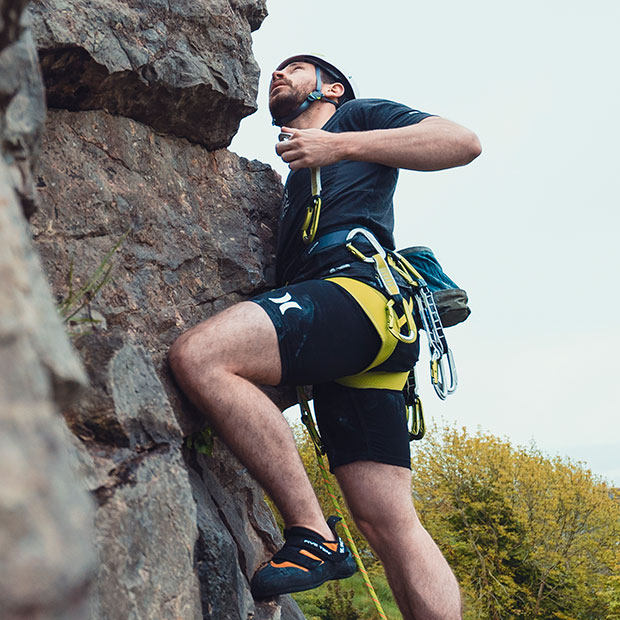 man rock climbing using edelrid bulletproof range